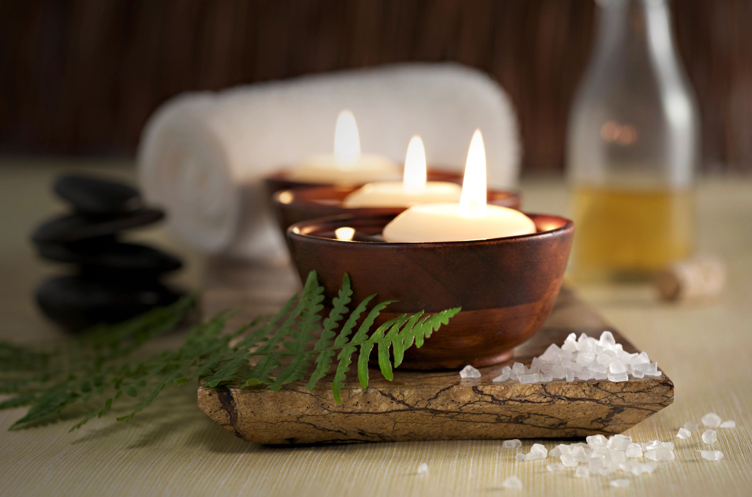 Serene spa candles and wellness atmosphere at Accent Beauty